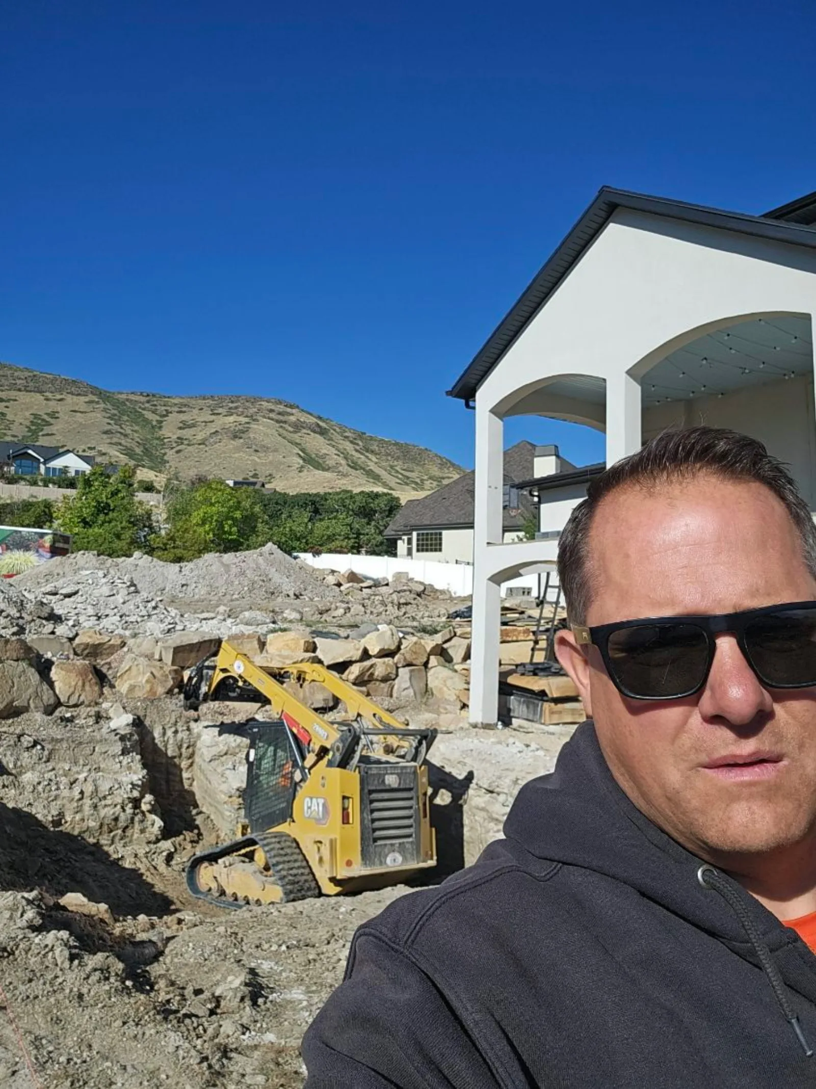 JB Landscaping & Construction crew on an excavation and retaining wall project in Utah